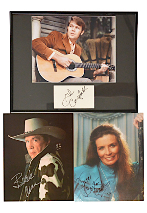 Autographed Framed Display W. Full Color Photos Featuring Glen Campbell, June Carter Cash & Buck Owens (3)(JSA)