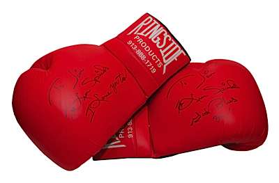 Pair of Leon Spinks Autographed Oversized Boxing Gloves (2) (JSA)