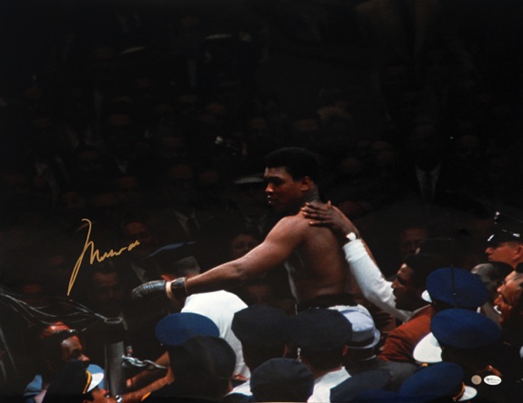 Muhammad Ali Being Carried Over the Crowd Autographed Photo (JSA) 