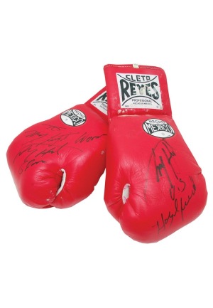 6/19/1992 Larry Holmes Fight Worn & Autographed Gloves vs. Evander Holyfield (2)(JSA)(Photos of Holmes with Gloves)