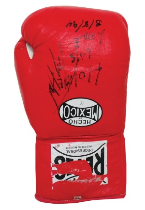 3/8/1994 Larry Holmes Fight Worn & Autographed Single Glove vs. Garing Lane (JSA)(Photos of Holmes with Glove)
