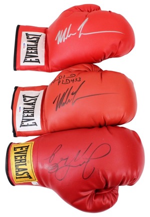 Floyd Mayweather Jr. & Two Mike Tyson Autographed Single Boxing Gloves (3)(JSA • PSA/DNA)